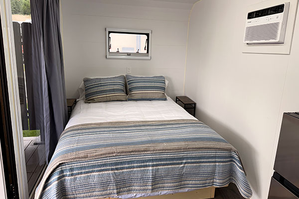 Our Tiny Homes queen bed.